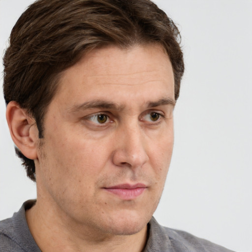 Neutral white adult male with short  brown hair and grey eyes