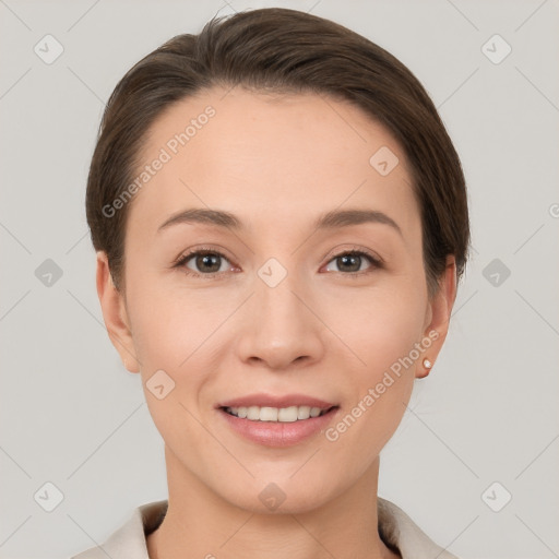 Joyful white young-adult female with short  brown hair and brown eyes