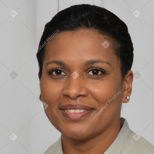 Joyful latino young-adult female with short  black hair and brown eyes