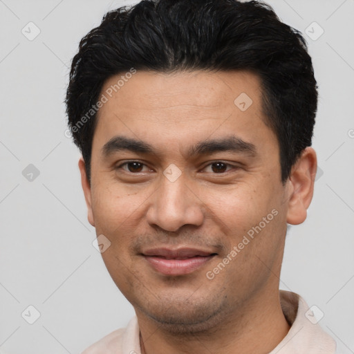 Joyful asian young-adult male with short  black hair and brown eyes