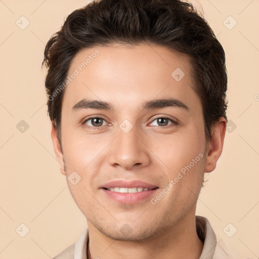 Joyful white young-adult male with short  brown hair and brown eyes