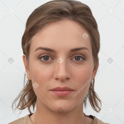 Neutral white young-adult female with medium  brown hair and grey eyes