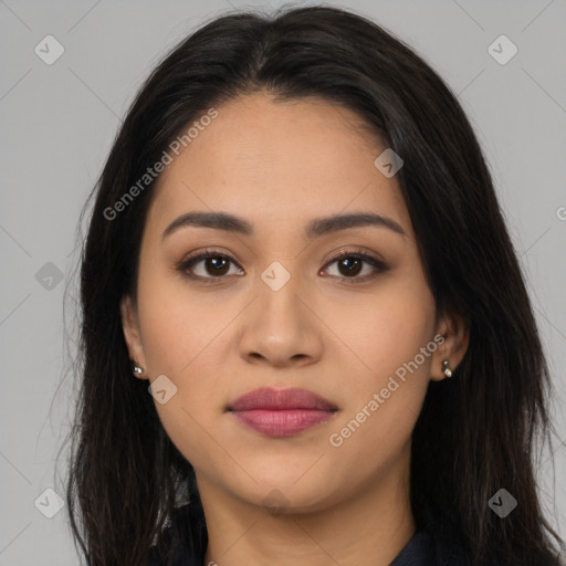 Joyful latino young-adult female with long  brown hair and brown eyes