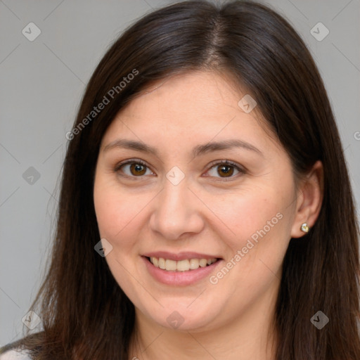 Joyful white young-adult female with long  brown hair and brown eyes