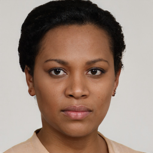 Neutral black young-adult female with short  black hair and brown eyes