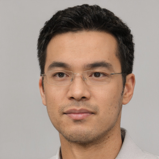 Neutral asian adult male with short  black hair and brown eyes