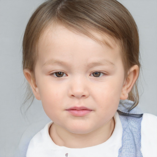 Neutral white child female with medium  brown hair and brown eyes