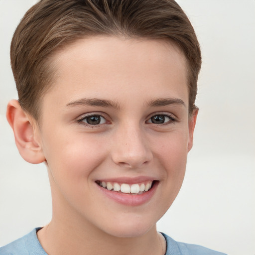 Joyful white child female with short  brown hair and grey eyes