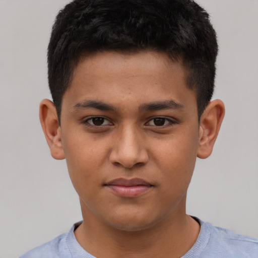 Joyful latino young-adult male with short  brown hair and brown eyes