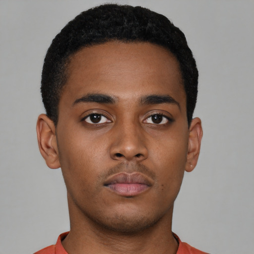 Neutral latino young-adult male with short  brown hair and brown eyes
