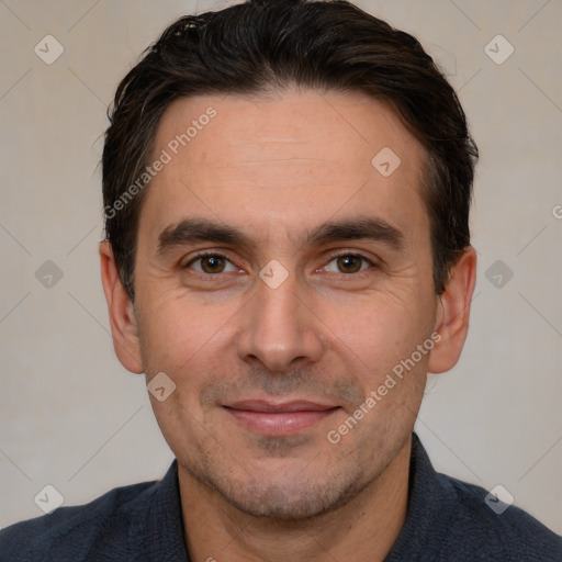 Joyful white adult male with short  brown hair and brown eyes