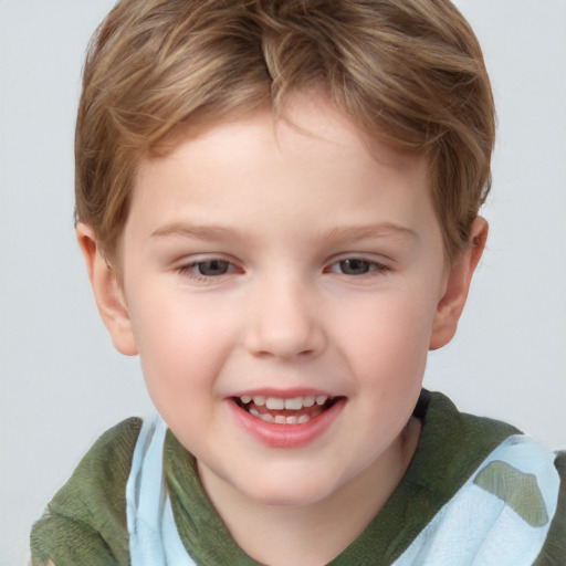 Joyful white child male with short  brown hair and grey eyes