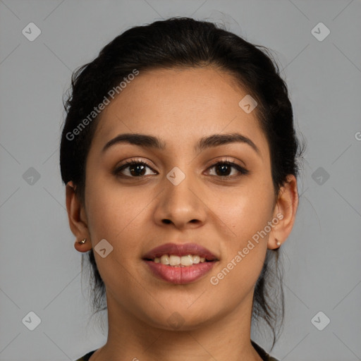 Joyful latino young-adult female with medium  brown hair and brown eyes