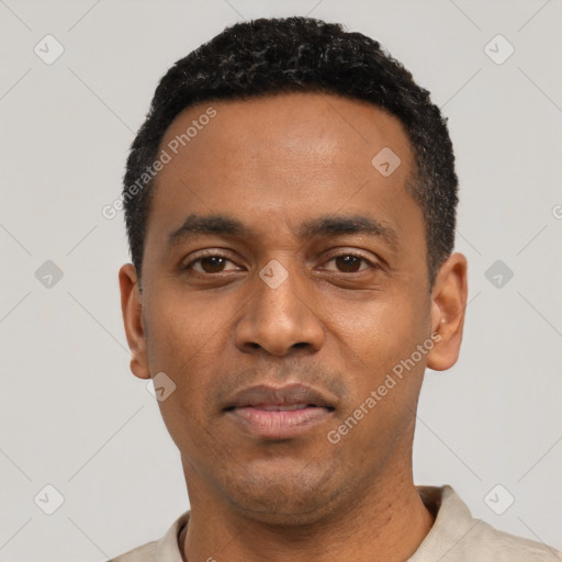 Neutral black young-adult male with short  black hair and brown eyes