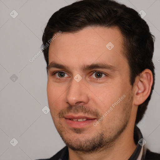 Joyful white young-adult male with short  brown hair and brown eyes