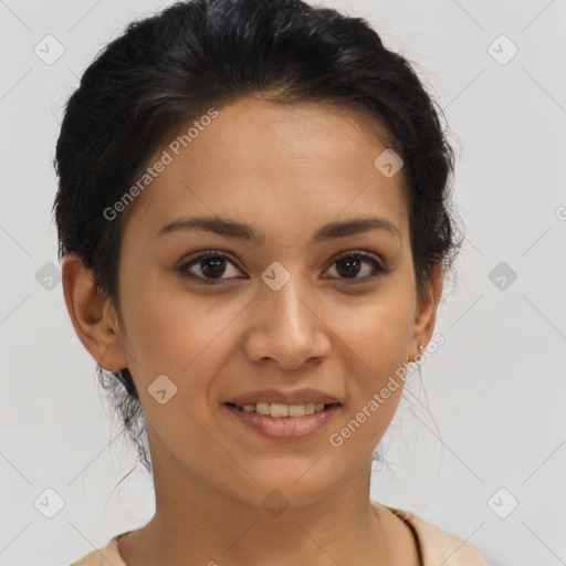 Joyful latino young-adult female with short  brown hair and brown eyes