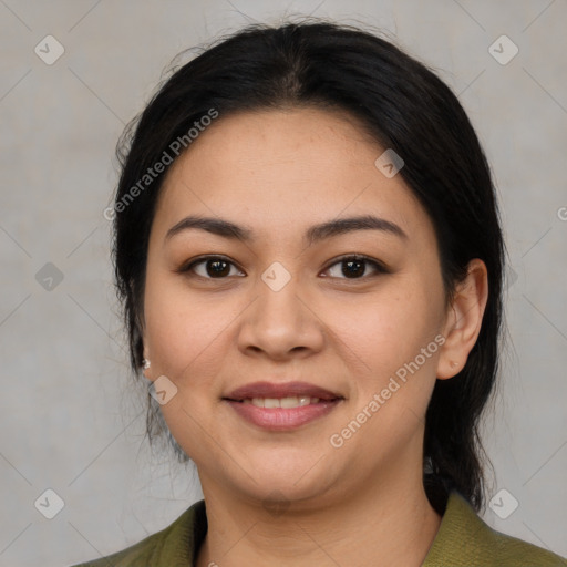 Joyful latino young-adult female with medium  black hair and brown eyes