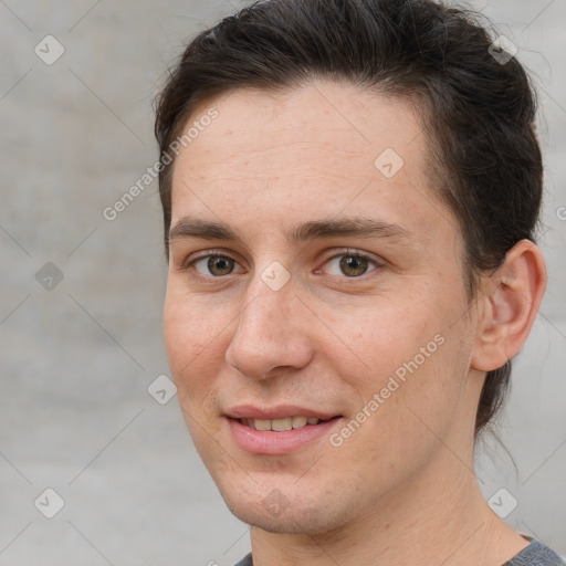 Joyful white adult female with short  brown hair and brown eyes