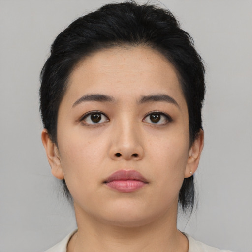 Neutral asian young-adult female with medium  black hair and brown eyes