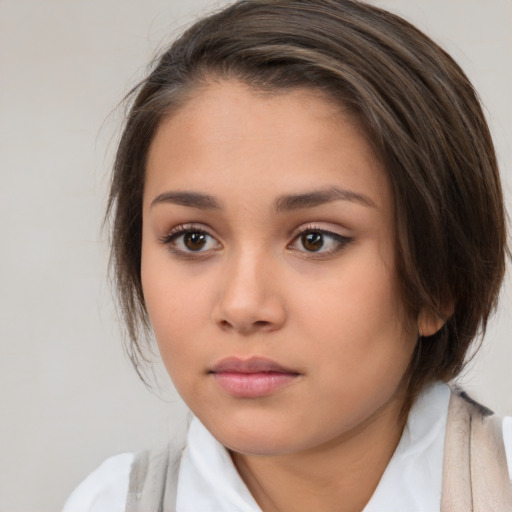 Neutral white young-adult female with medium  brown hair and brown eyes