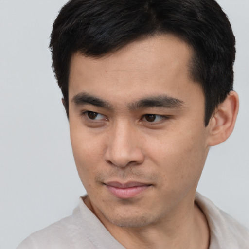 Neutral white young-adult male with short  black hair and brown eyes