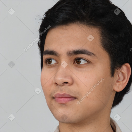 Neutral latino young-adult male with short  black hair and brown eyes