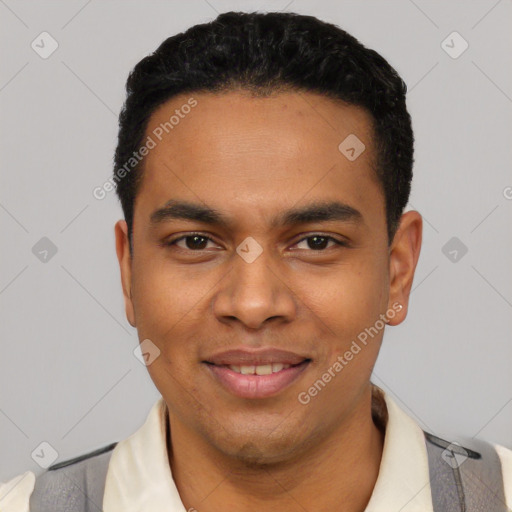 Joyful latino young-adult male with short  black hair and brown eyes