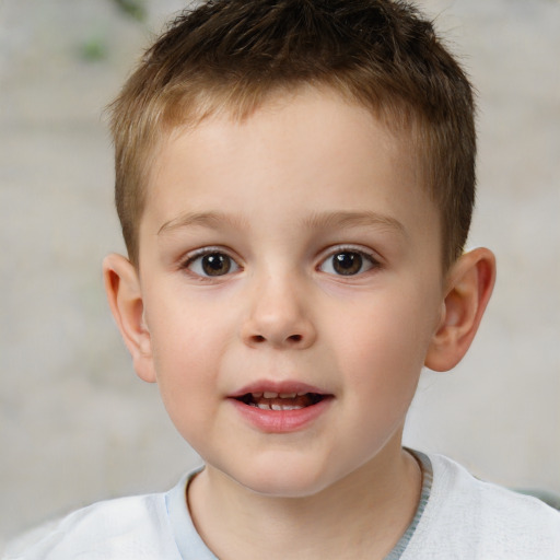 Joyful white child male with short  brown hair and brown eyes