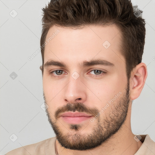 Neutral white young-adult male with short  brown hair and brown eyes