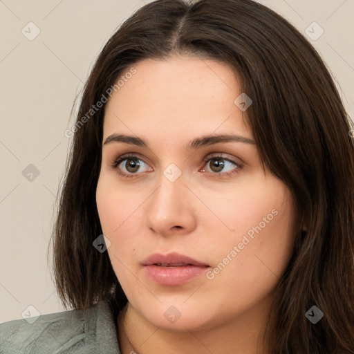 Neutral white young-adult female with long  brown hair and brown eyes