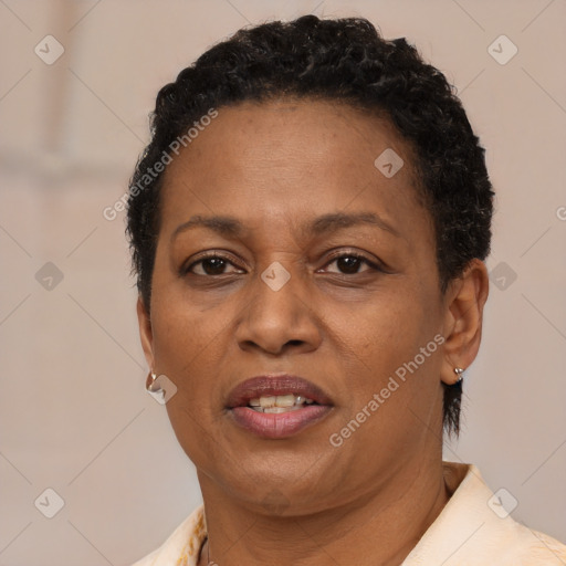 Joyful black adult female with short  brown hair and brown eyes