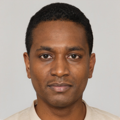 Neutral black young-adult male with short  black hair and brown eyes