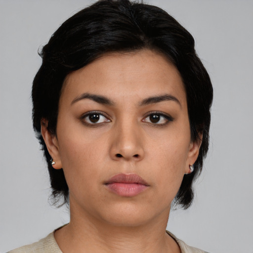 Neutral latino young-adult female with medium  black hair and brown eyes