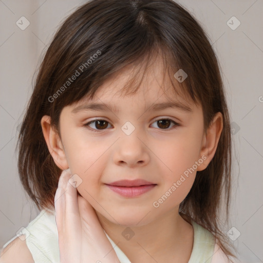 Joyful white child female with medium  brown hair and brown eyes