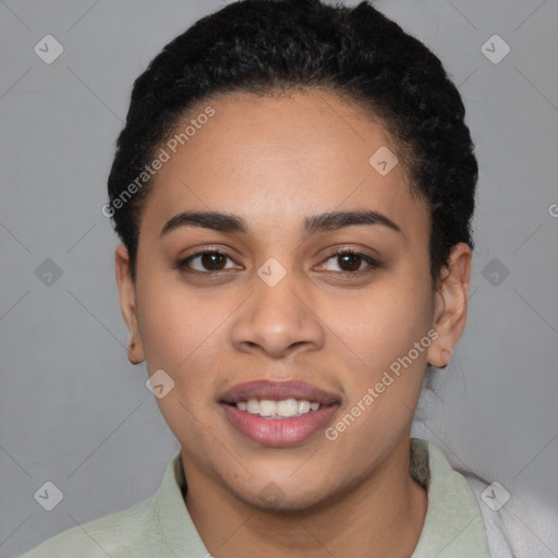 Joyful latino young-adult female with short  black hair and brown eyes