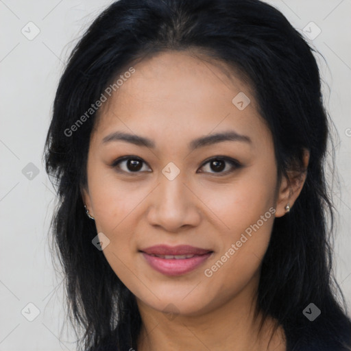 Joyful asian young-adult female with long  black hair and brown eyes