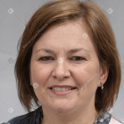 Joyful white adult female with medium  brown hair and brown eyes