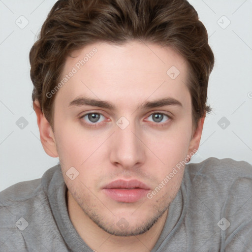 Neutral white young-adult male with short  brown hair and grey eyes