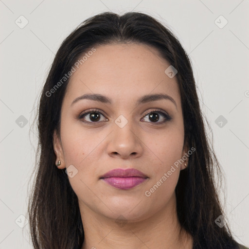 Joyful latino young-adult female with long  brown hair and brown eyes