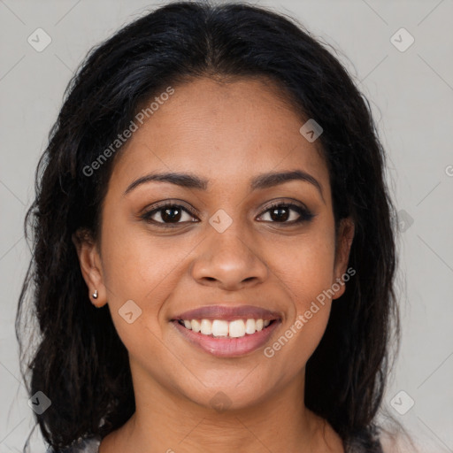 Joyful latino young-adult female with long  brown hair and brown eyes