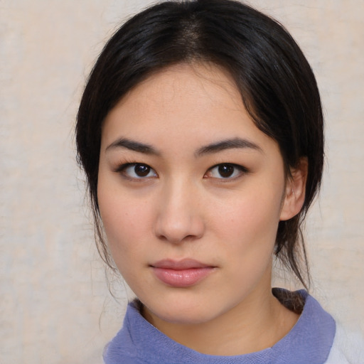 Neutral asian young-adult female with medium  brown hair and brown eyes