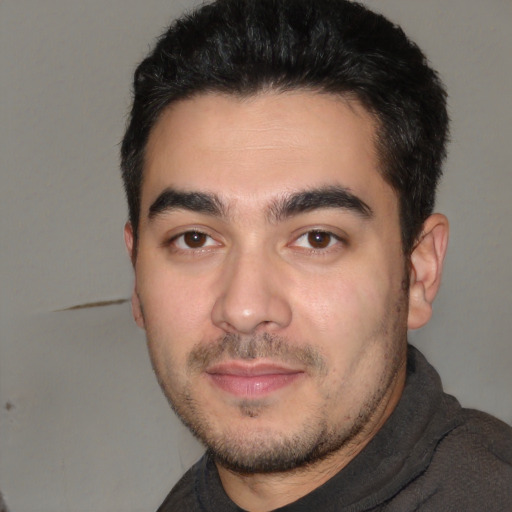Neutral white young-adult male with short  black hair and brown eyes