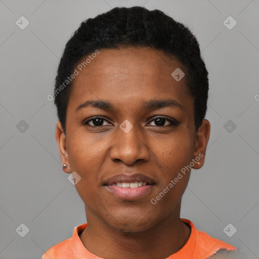 Joyful black young-adult female with short  black hair and brown eyes