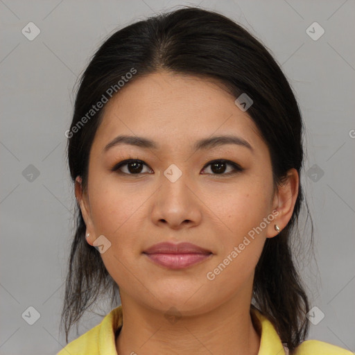 Joyful latino young-adult female with medium  brown hair and brown eyes