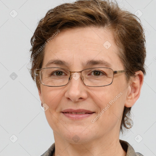 Joyful white adult female with short  brown hair and grey eyes