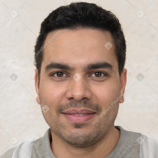 Joyful white young-adult male with short  black hair and brown eyes