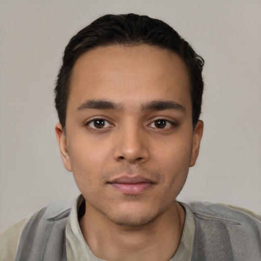 Neutral white young-adult male with short  black hair and brown eyes