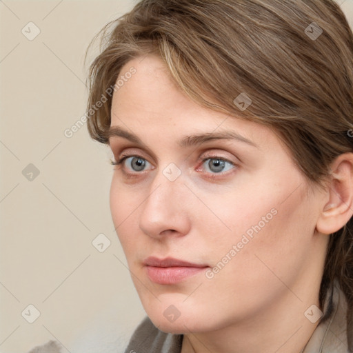 Neutral white young-adult female with long  brown hair and grey eyes