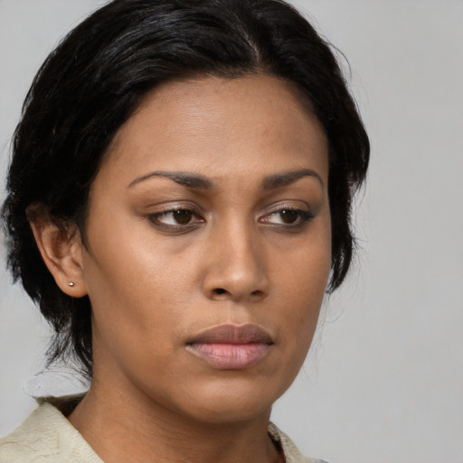 Neutral asian young-adult female with medium  brown hair and brown eyes