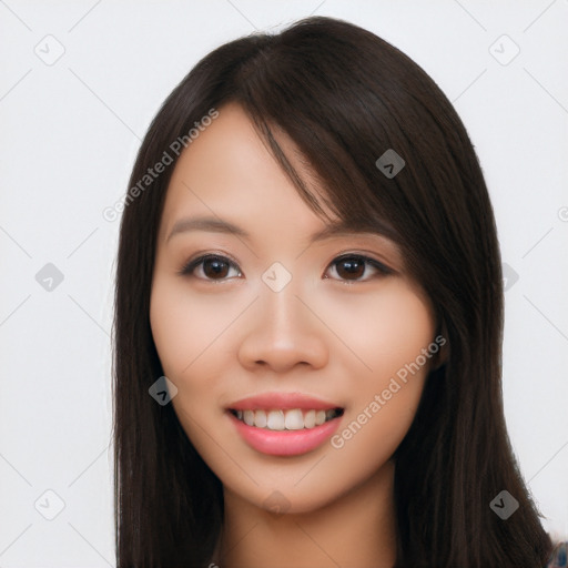 Joyful asian young-adult female with long  brown hair and brown eyes